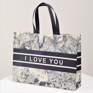 Coated non-woven bag in stock advertising non-woven handbag printed logo men's fashion portable packing bag retro