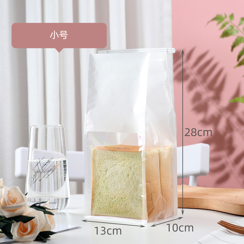 Bolsas de tostadas, bordes de alambre de hierro, sellado, pan rebanado, leche, dátiles, crispado de nieve, horneado transparente, punto oeste