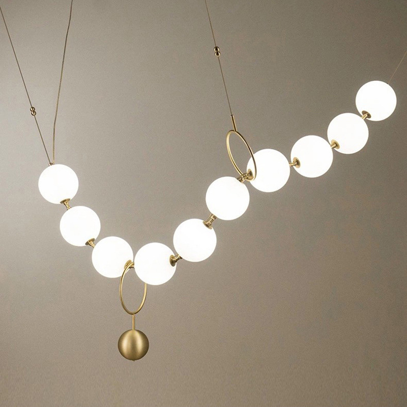 Collar de lámpara de diseño ventana ligera escalera lámpara de lujo moderno bar de bolas diseñador postmoderno ropa creativa