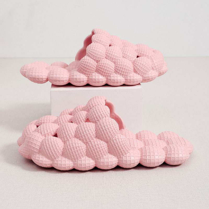 Sandalias de verano al por mayor desgaste de las mujeres al aire libre hogar grueso inferior pareja interior antideslizante EVA casa antideslizante zapatillas de burbuja