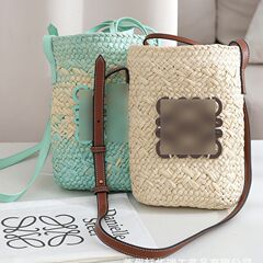 2023 New Luo Family Vacation Style Grass Weaving Bag Tumbler Beach Travel Crossbody Woven Bag Versatile Bucket Bag Wholesale