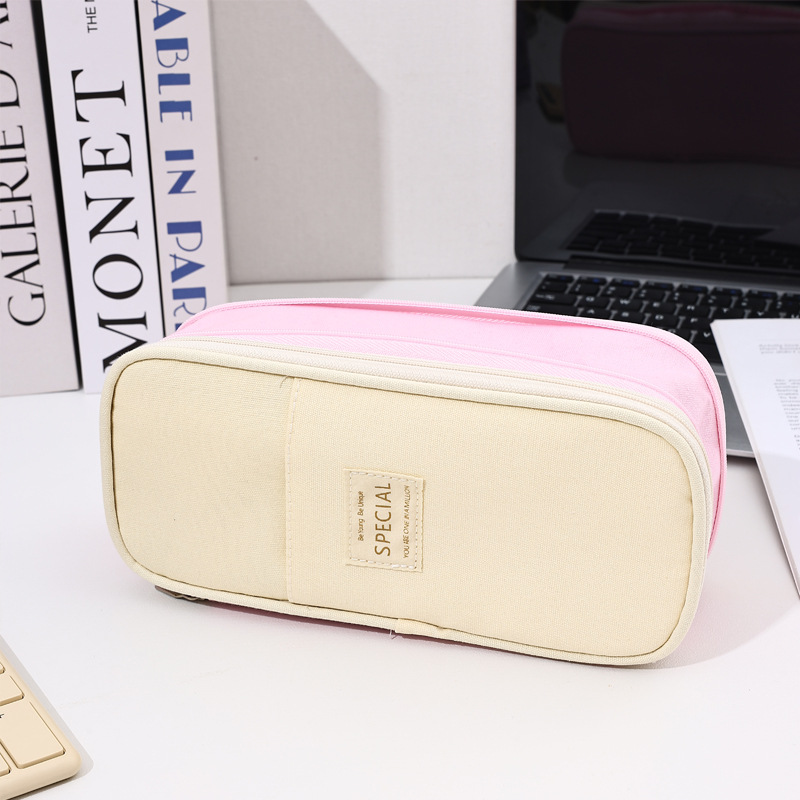 Bolso de lápices retráctil de lona de color de contraste de estilo explosivo transfronterizo Bolso de papelería de gran capacidad con doble cremallera simple multifuncional para estudiantes