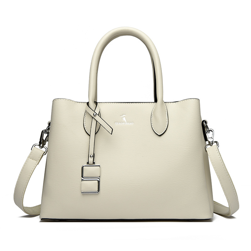 Nuevo bolso de mujer simple de moda, bolso de mano de cuero suave de gran capacidad, bolso de tela de mujer, bolso de canguro