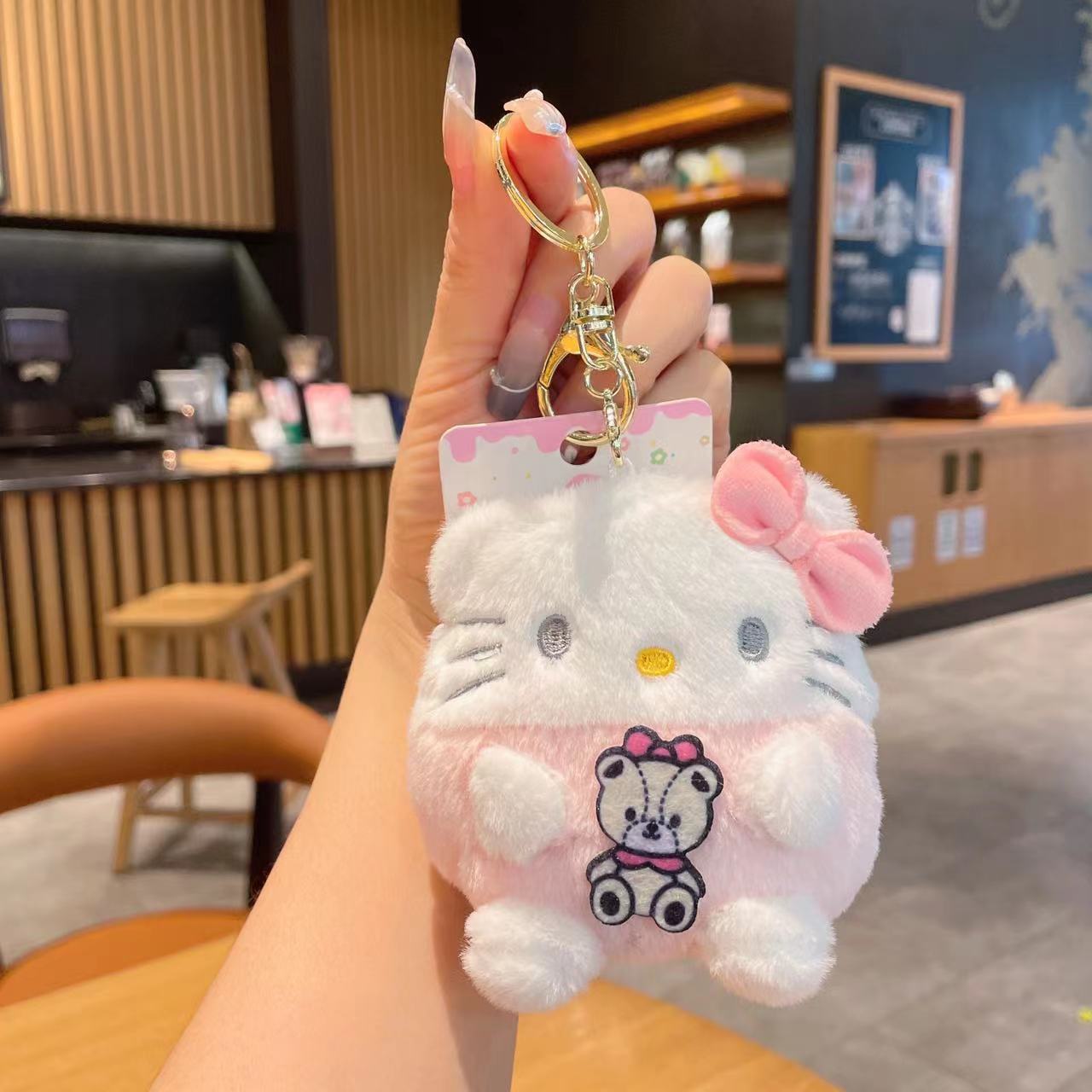ぬいぐるみのかわいいアクセサリーのぬいぐるみのペンダント卸売りのおもちゃの子供のかばんの漫画の子供の鍵は子供の機械をつかみます。