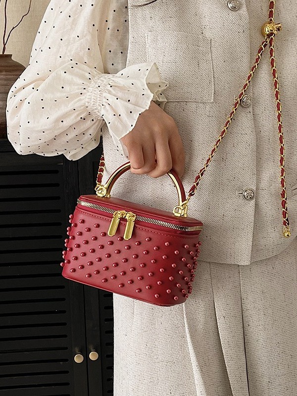 Caja de mano de alta sensación, bolso cuadrado pequeño para mujeres 2026 nueva moda transfronteriza nicho de moda ligero de lujo cadena mochila