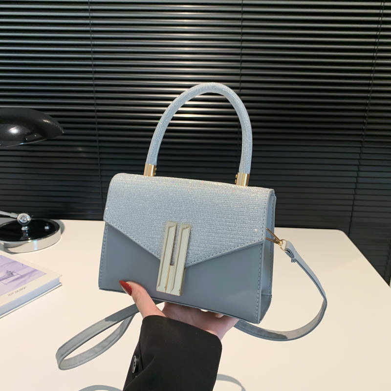 Temperamento coreano de mujer de viaje ins textura color contrastante empalme bolso casual2024 textura retro mochila de hombro