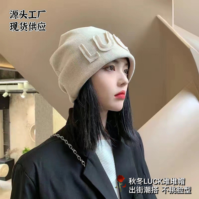Autumn and winter women's pile hat LUCK letter cold hat Japanese style all-match pullover hat face-looking small closed toe patch hat