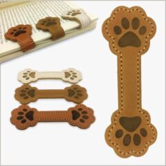磁気革のしおりはかわいい犬の爪の形の磁石の本を読みます。