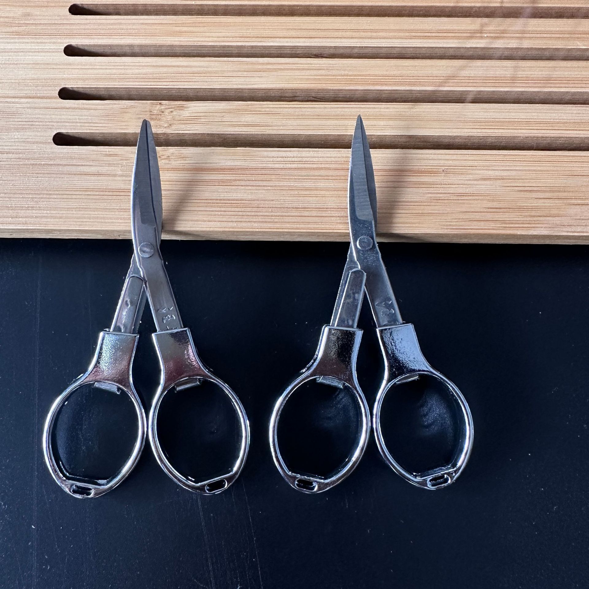 Tijeras de pesca de acero inoxidable 8 tijeras de pesca tijeras plegables línea de pescado de piel de plomo Wang Wu tijeras de ocho caracteres