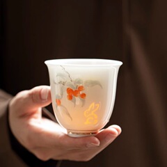 精巧な花の神の杯の白磁のお茶の杯の品茗杯の主人の杯の家庭用の陶磁器の1杯の工夫のお茶の贈り物の礼箱