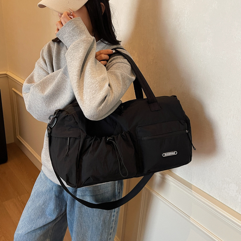 2025 nueva bolsa de viaje de gran capacidad para mujeres ligera separación seca y húmeda nadadora bolsa de equipaje de gimnasio portátil