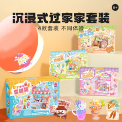 子供の女の子の手作りのdiyアイスクリームのアイスクリームのクリームのゴムのデザートの先生は食事を作って小さいデザートの駅を遊びます。