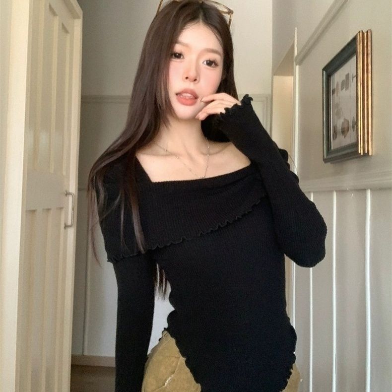 フランス風の気質の木の耳元の立体的な花の一字の肩のニットの上着の修身のセーターの底のシャツの女性は秋冬を掛けます。