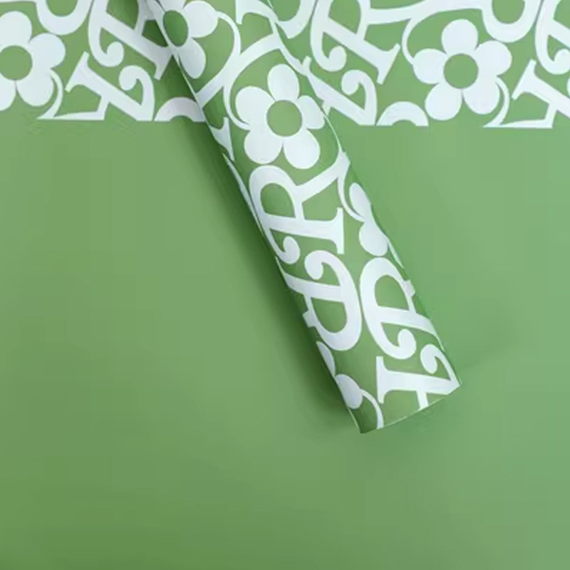 Papel Yuyin transfronterizo Marca de moda Papel de embalaje de flores coreano Película perlada impermeable Floristería Ramo de flores Material de papel al por mayor