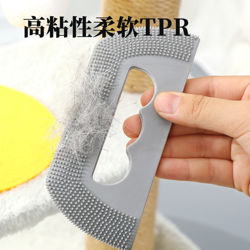 毛の整理はペットの柔らかいゴムの歯の櫛をブラシします。|undefined