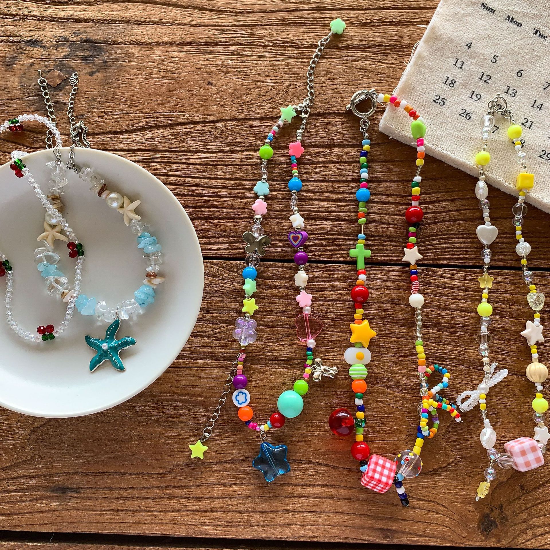Sugar Pear ropa infantil decoración de niñas collar de arco de cuentas de dopamina colorido 2026 accesorios dulces para mujeres