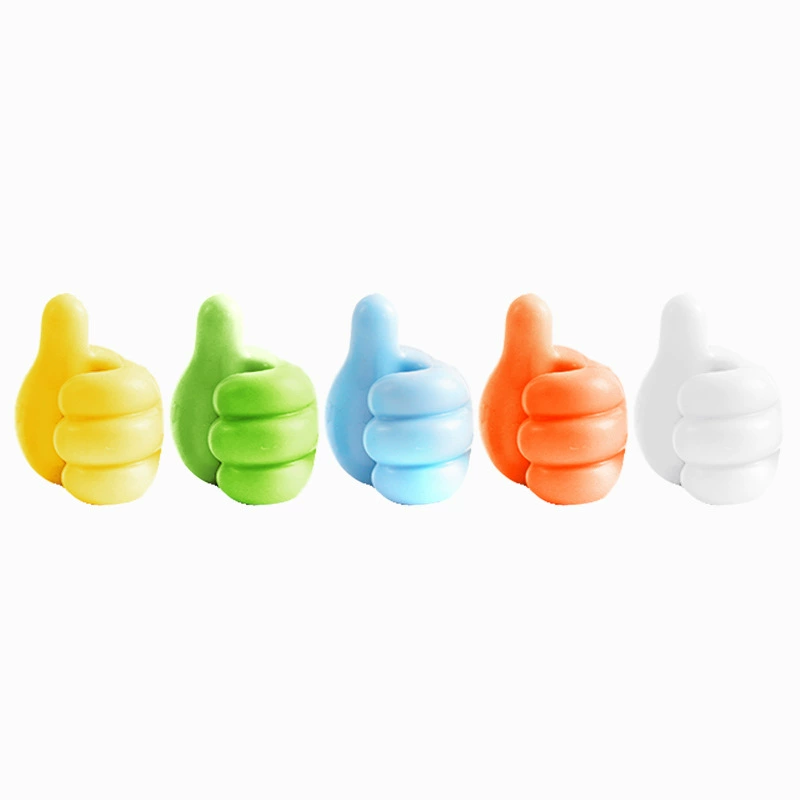 Thumb -linked thread -mounted desktop data cable storage charger fixing device wall without trace avoiding punching sticky hook