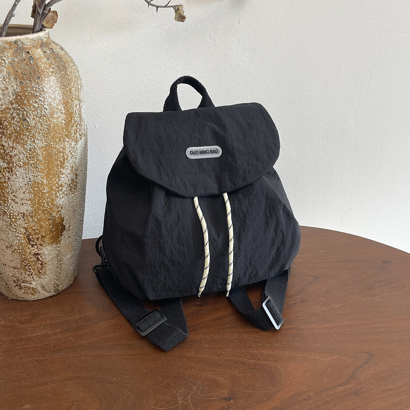Nuevo estilo de chicas chicas estudiantes de color extranjero flip-off mochila de moda para salir mochila pequeña ocio