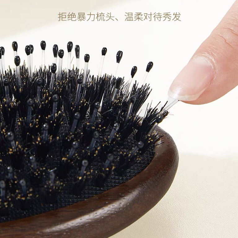 豚のたてがみの毛のクッションの櫛のエアバッグはマッサージして頭皮の経絡を櫛にします。|undefined