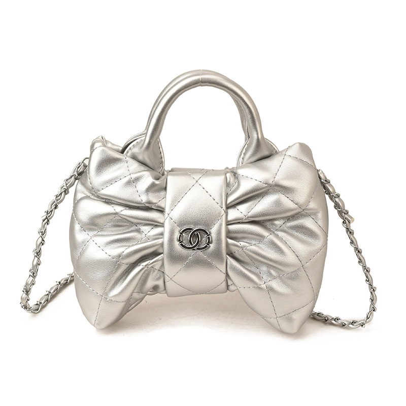 Bolsa de mano de chicas arco dulce cadena de diamante pliegue bolso de hombro 2026 nuevo bolso infantil transfronterizo