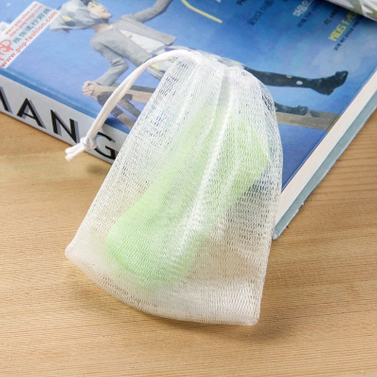 泡立てネットの白いひもの泡ネットの手作り石鹸の洗顔ネットの洗顔ネットの石鹸ネットの泡ネットの工場は直接販売します。|undefined
