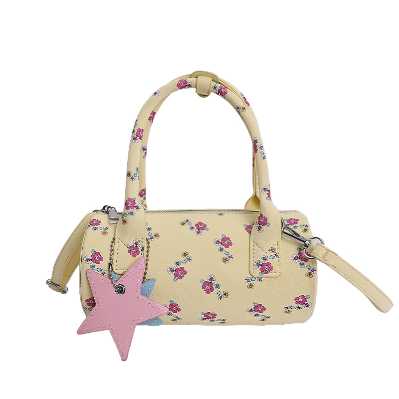 Moda nueva pequeña flor de mujer 2026 nueva bolsa de almohada de viaje mochila de hombro bolso bajo la axila de nicho