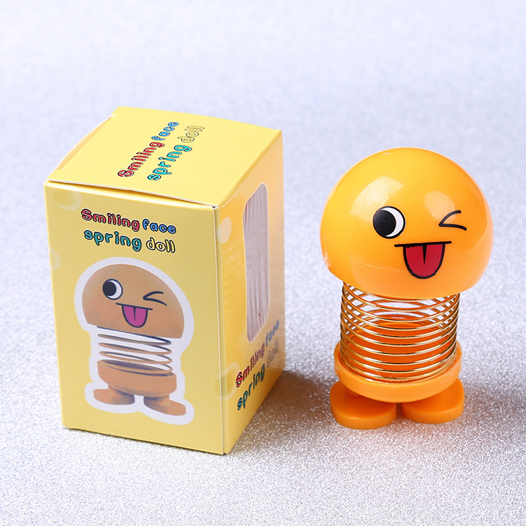 Tiktok mismo estilo sacudiendo cabeza expresión facial bolsa muñeca personalidad creativa Smiley cara coche primavera estudiante Escuela Primaria Decoración