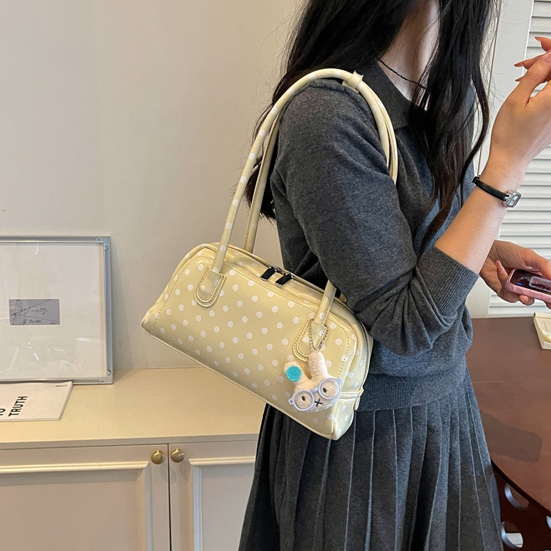 La versión coreana de Xiaozhong Wa punto de bolso de almohada de mano casual 2026 nueva moda versátil bolso de hombro bolso de brazo de alto valor