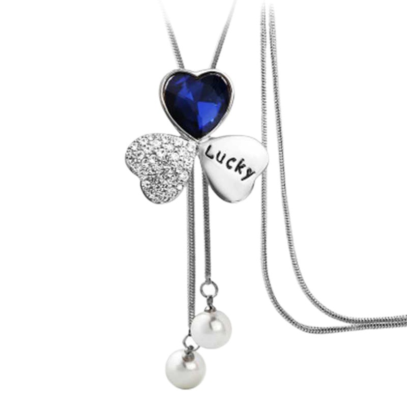 Corea del Sur moda Lucky Clover suéter cadena larga otoño Mujer Todo fósforo suéter colgante flor accesorios collar nuevo