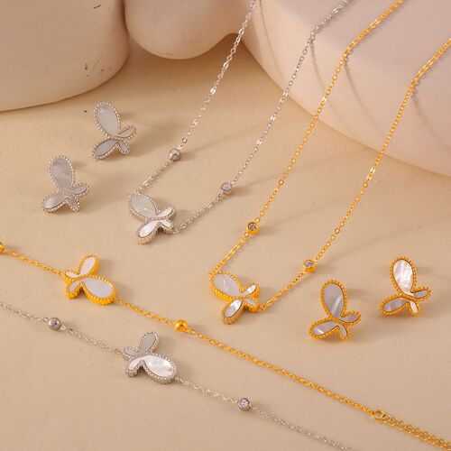 Elegant French-style jewelry set featuring a delicate, butterfly-shaped pendant with white shell inlay and a gentle, feminine design—crafted from titanium steel with gold-plated finish.