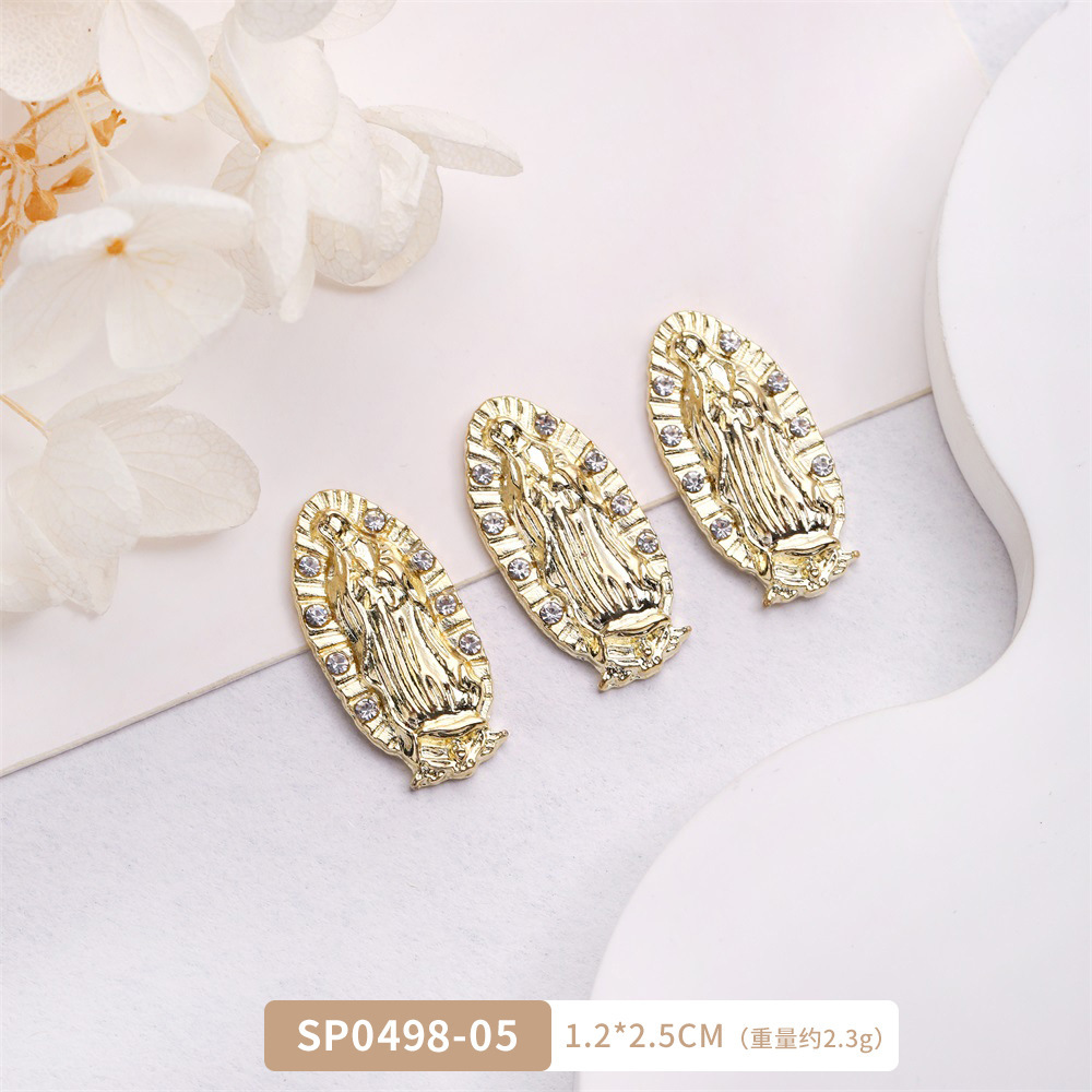 Arte de uñas transfronterizo Jesús accesorios de metal DIY vintage metal aleación uñas arte joyería europea y americana Luz de lujo accesorios con diamante