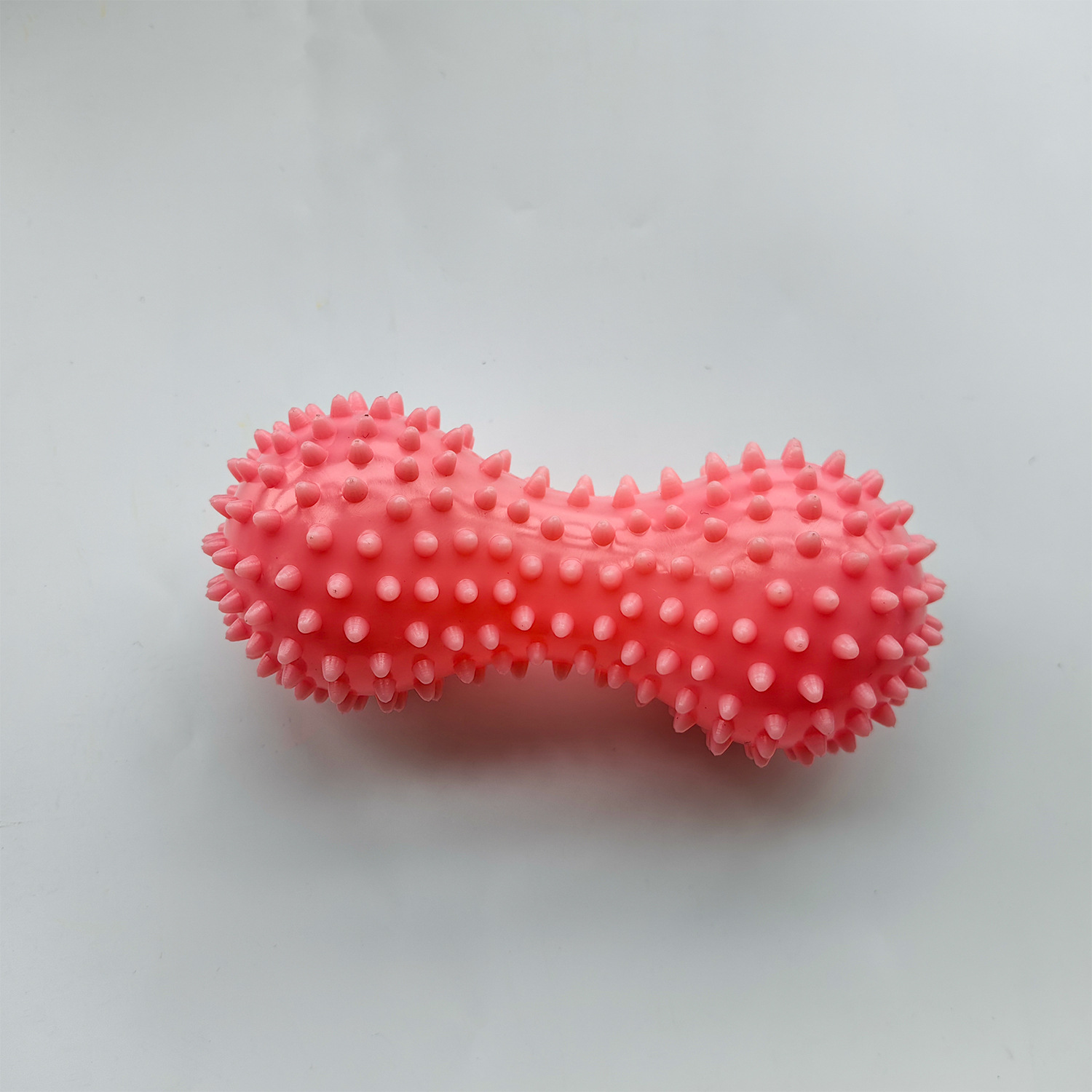 Pink peanut spiked ball