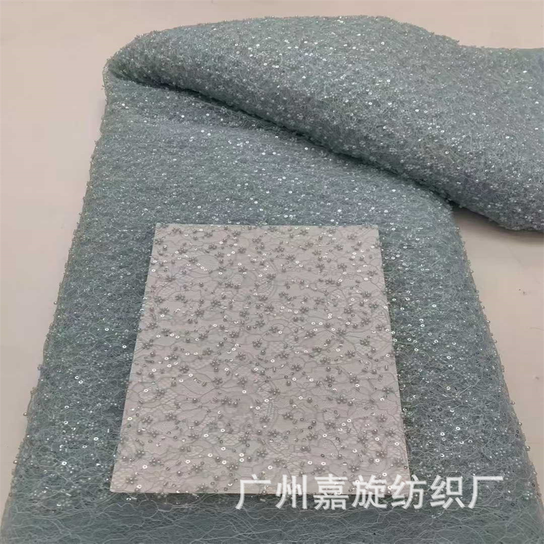 Explosiones de bordado suave encaje de arroz flor de ciruela + pequeño vestido de boda de tubo largo cheongsam tela de encaje francés