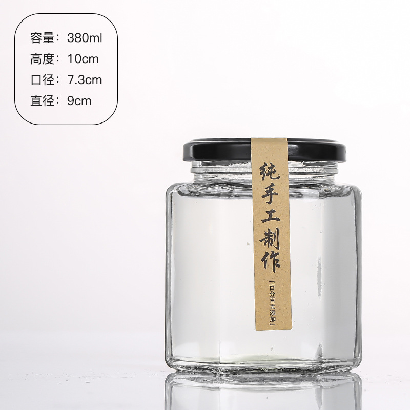 Hexagonal de vidrio enlatado sellado de grado alimenticio con tapa vacía un kilo de pasta de limón, miel, pimienta, botella de mermelada