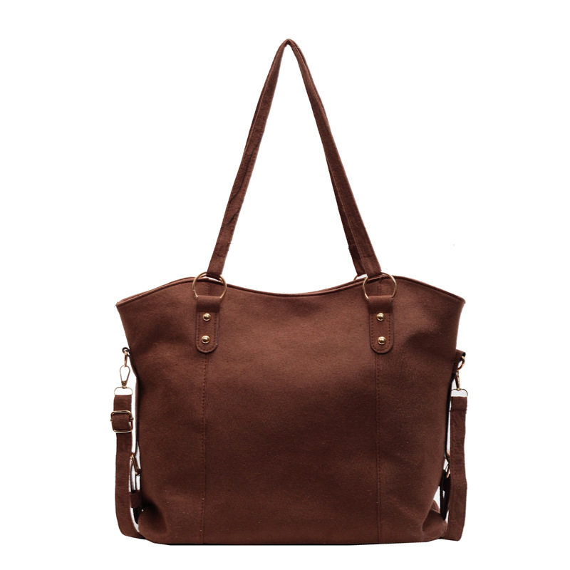 Bolso de gran capacidad de textura de comercio exterior para mujeres 2024 nueva moda retro viaje al trabajo bolsa de hombro mochila