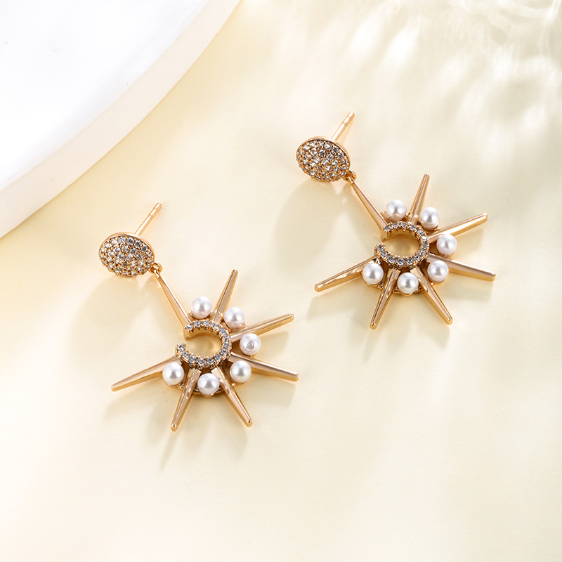 Joyas Xuping chapado 18K imitación de perlas erizo de mar pendientes de diamantes en forma de C pendientes de diseño creativo de flores de sol pendientes para mujeres