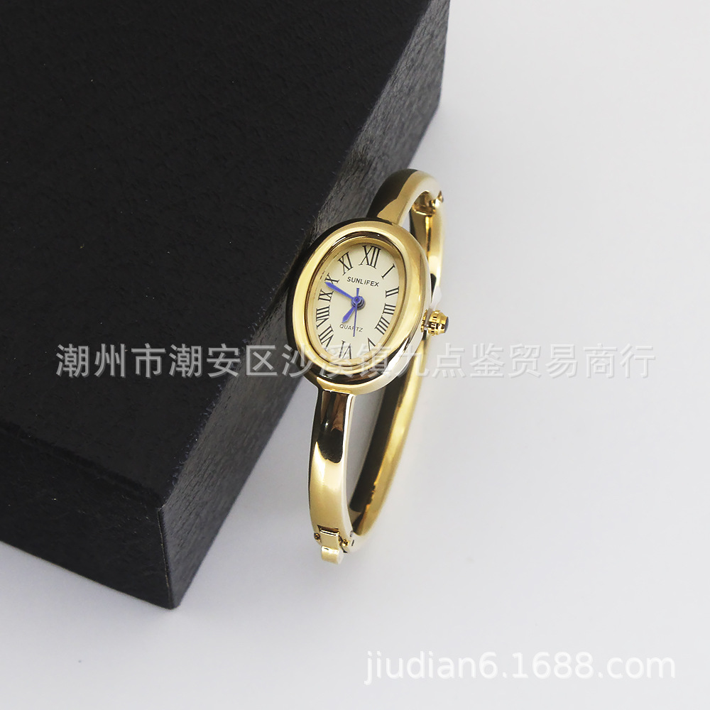 Gold strap gold dial watch