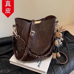 香港本革今年人気のバケットバッグ女性用 2025 春夏新作レトロ多用途ハイエンド