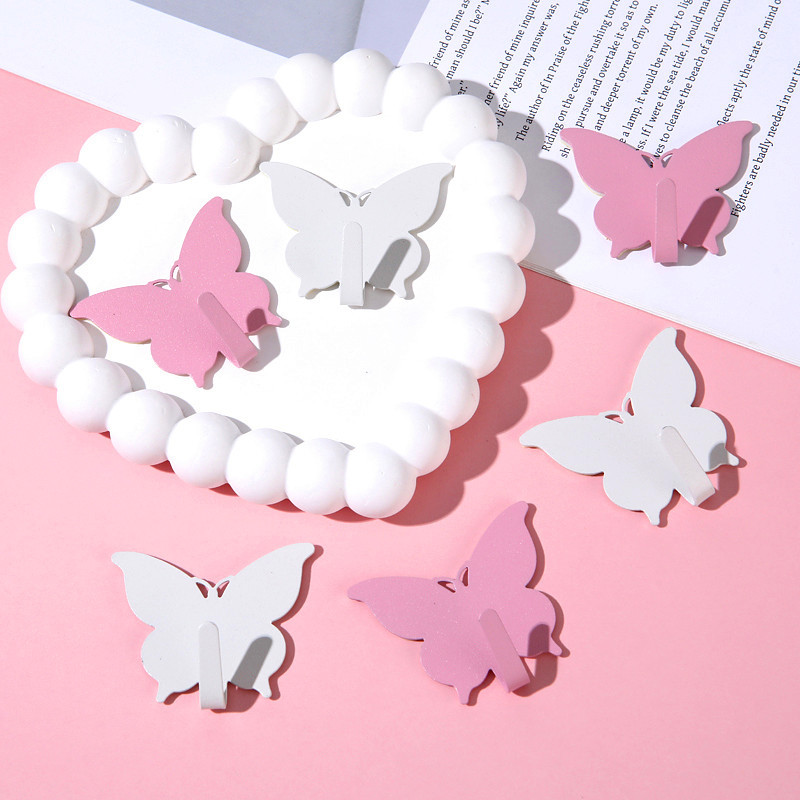 Gancho de mariposa fuerte sin agujeros ins viento encantador gancho adhesivo de corazón de niña decoración de pared de habitación gancho adhesivo de alto valor visual