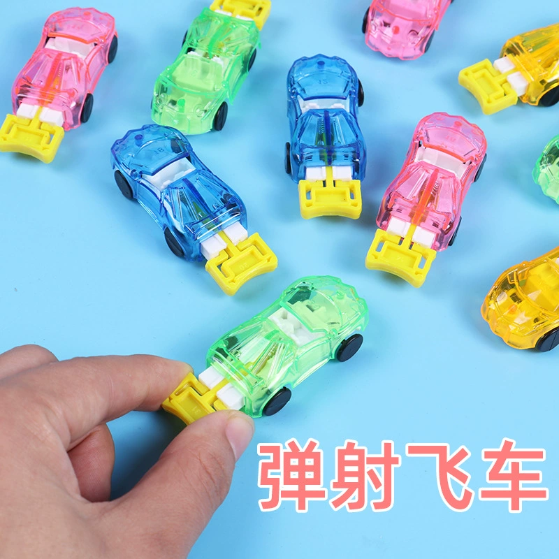 Катапультный автомобиль гоночная пусковая установка катапультная тележка инерционный прыжок маленькая тележка полицейская машина пластиковая тележка через границу для детей