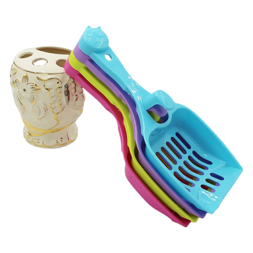 Venta al por mayor mascota gato arena pala caramelo color gato cabeza gato pala gato mierda pala estiércol hueco de plástico alimentos pala suministros