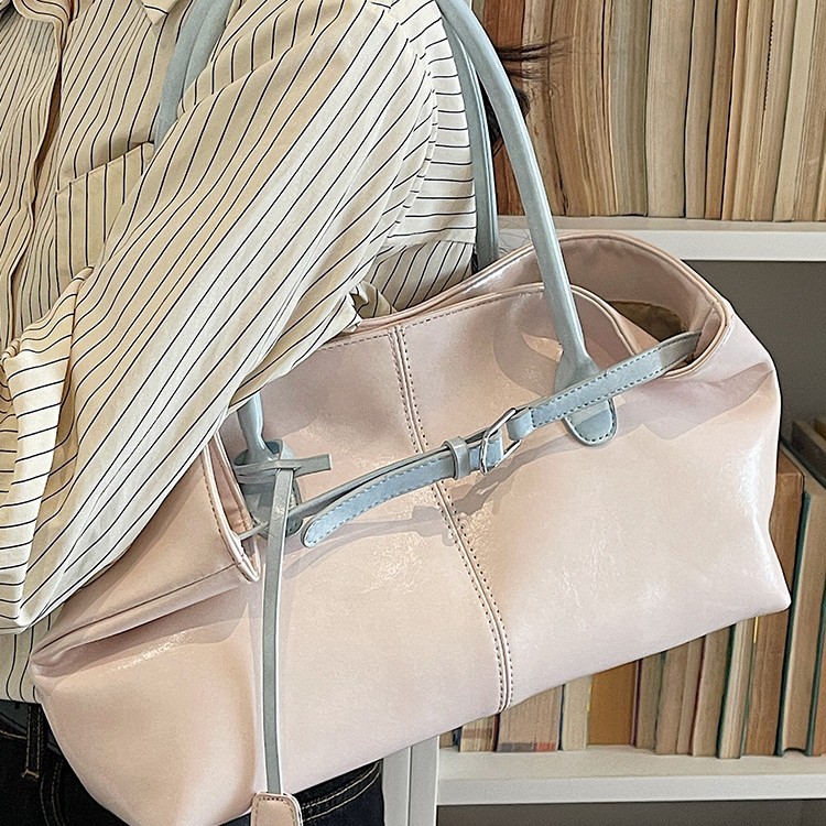 Bolsos de tendencia diaria coreana 2026 primavera nueva moda simple gran capacidad bolso de hombro bolso especial