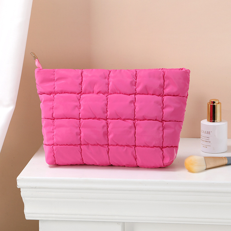 Bolsa de cosméticos Lingge de moda 2025 otoño e invierno nuevo estilo bolso de textura de nicho simple bolso de embrague casual coreano femenino