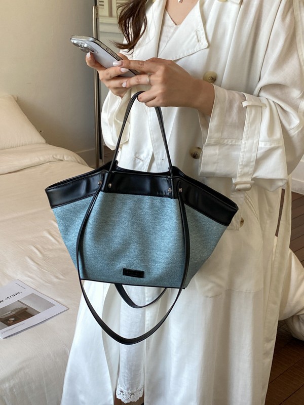 Bolso de mano de gran capacidad para mujeres 2026 nuevo nicho de color de colisión de la bolsa de viaje tote casual simple bolso de hombro axilar
