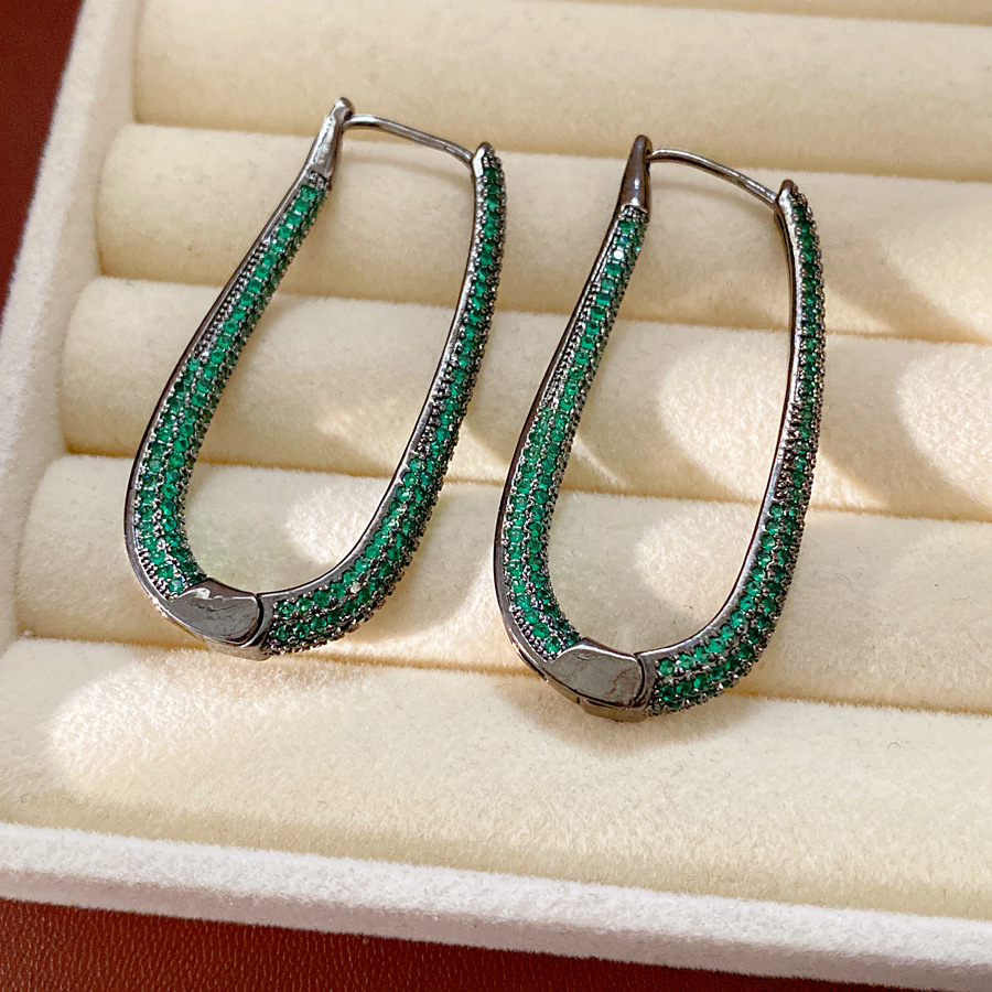 Medieval vintage zircón oval pendientes de estilo retrógrado personalidad pendientes ligeros de lujo alta sensación auriculares al por mayor