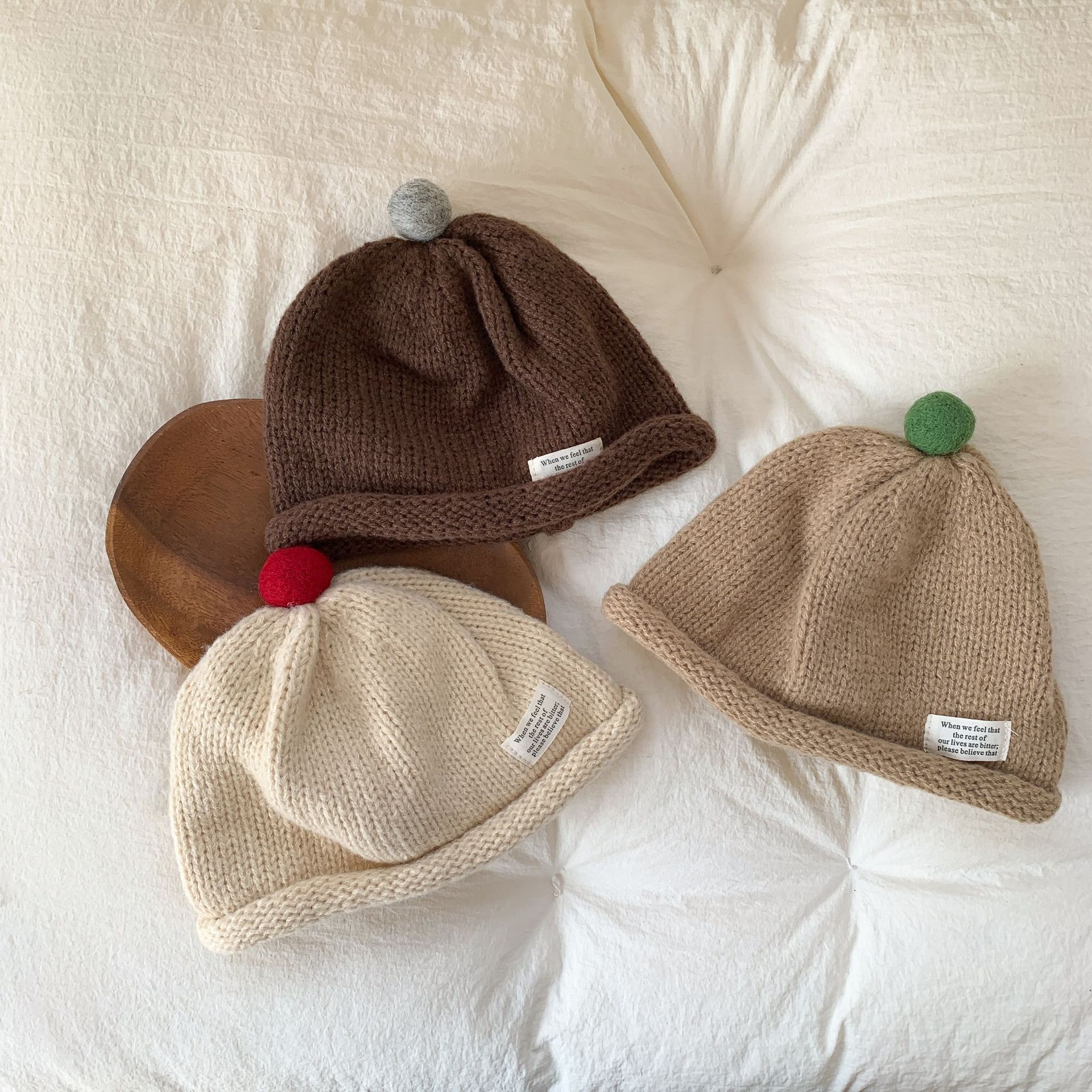 Sombreros de Año Nuevo para niños otoño y invierno niñas sombreros de lana sombreros de punto 2024 nuevos bebés de invierno sombreros de oído calientes
