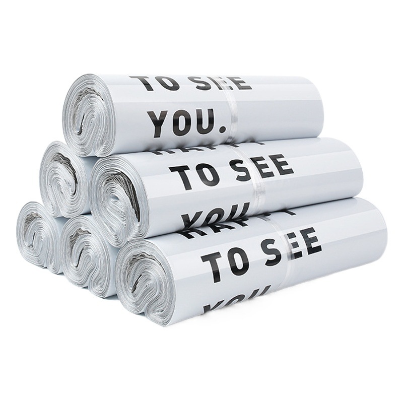 Bolsa de mensajería gruesa blanca, bolsa de embalaje, material nuevo, bolsa de impresión en inglés, bolsa de embalaje de envío de ropa de logística, bolsa impermeable