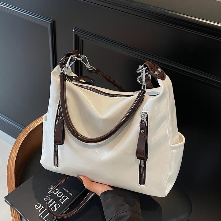 Bolsos de gran capacidad para mujer 2025 nuevo bolso de súper fuego de comercio exterior Bolso de axila de un solo hombro de varios bolsillos