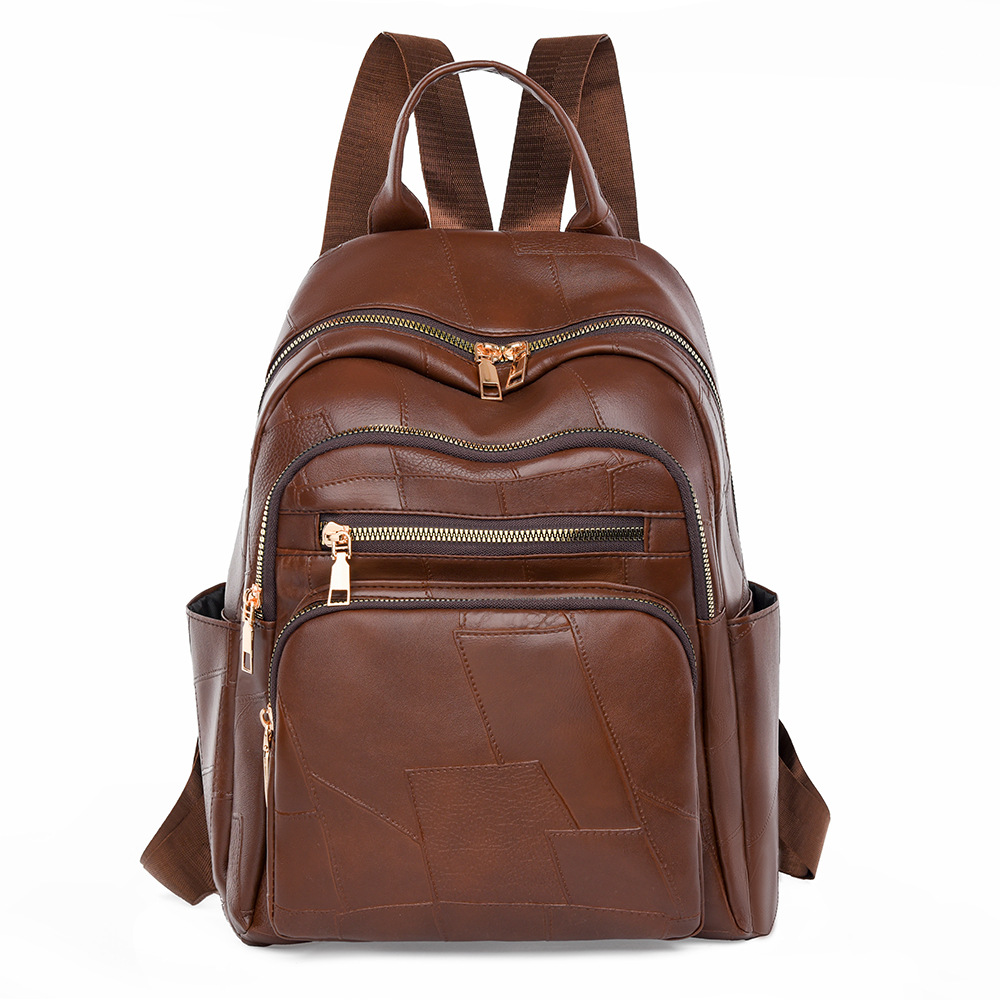 Mochila femenina 2024 nueva mochila de cuero suave simple de gran capacidad bolso ligero de moda bolso de viaje de viaje