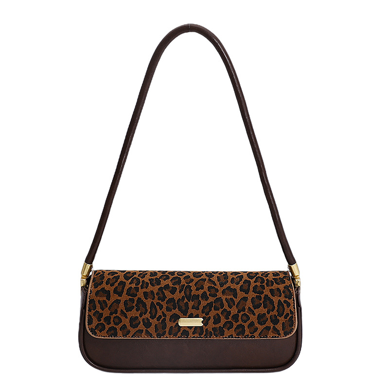 Bolsas de brazo retro de moda transfronteriza mujeres 2025 invierno nuevo estilo francés nicho bolsas de palo de moda bolsas de hombro casuales